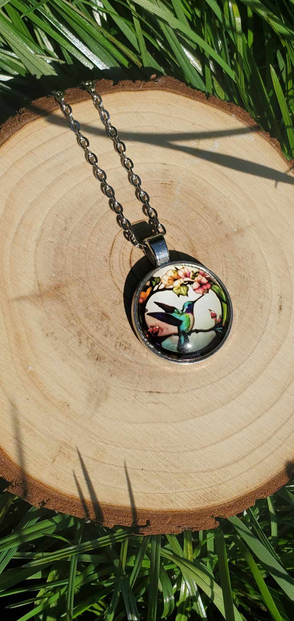 Collier colibri sous verre
