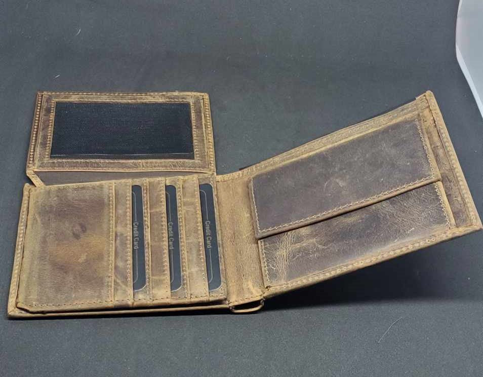 Portefeuille en cuir de vachette 512104