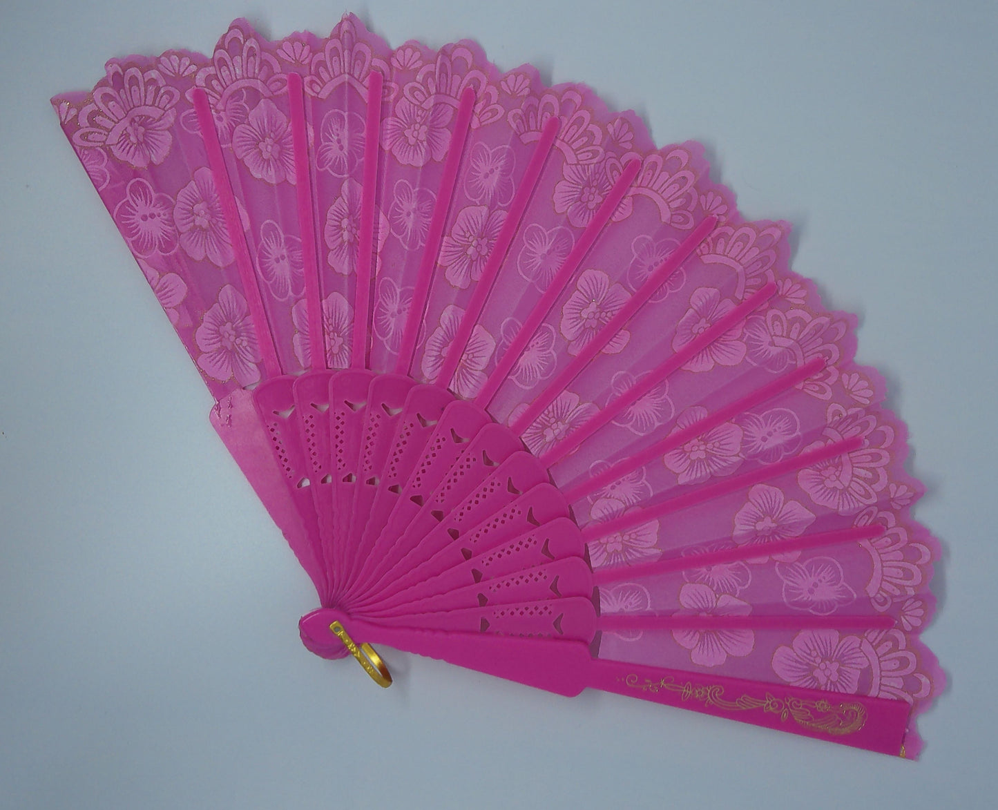 Eventail rose bonbon motifs fleuris et pailletés
