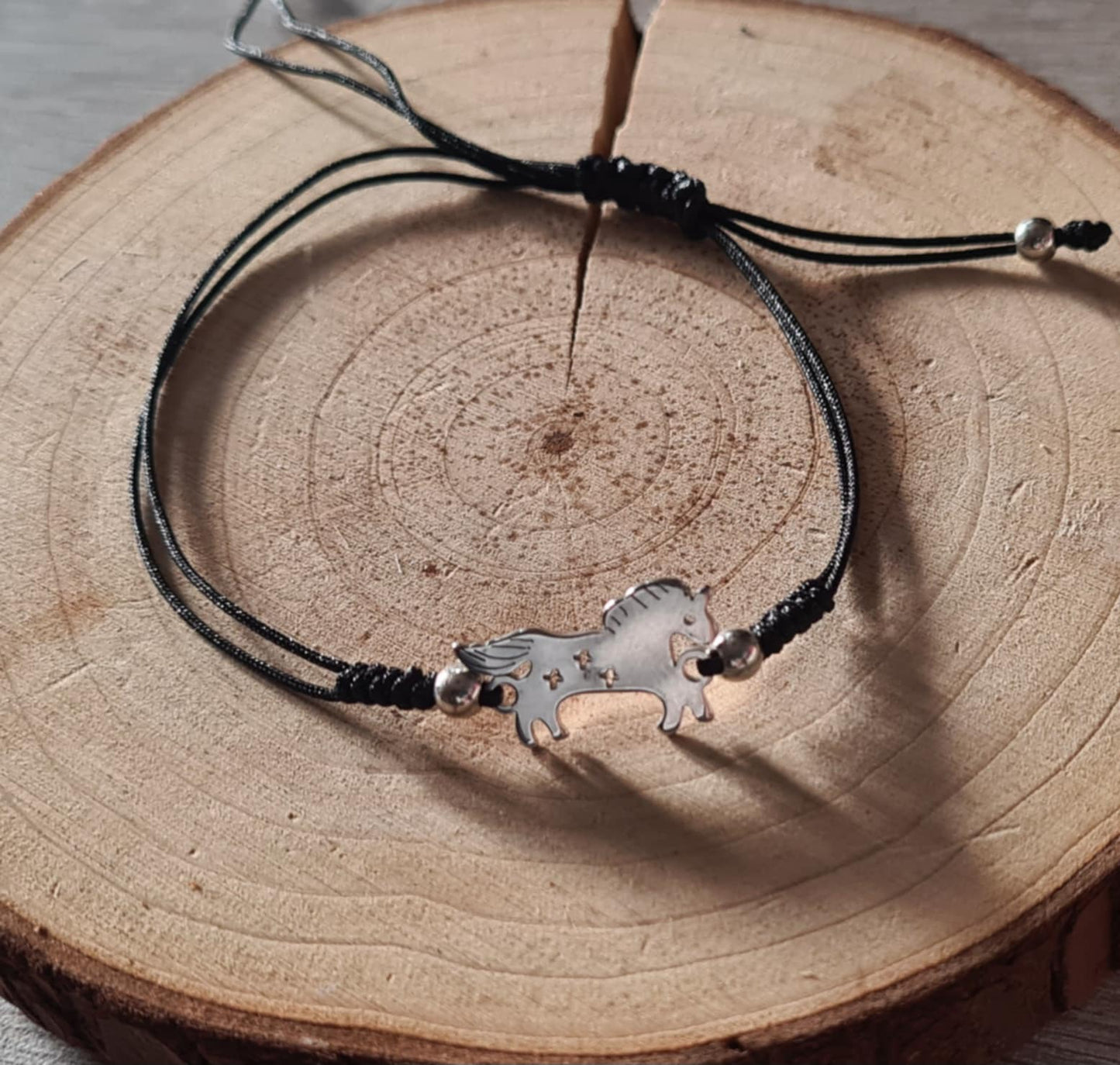 Bracelet symbole en acier inoxydable