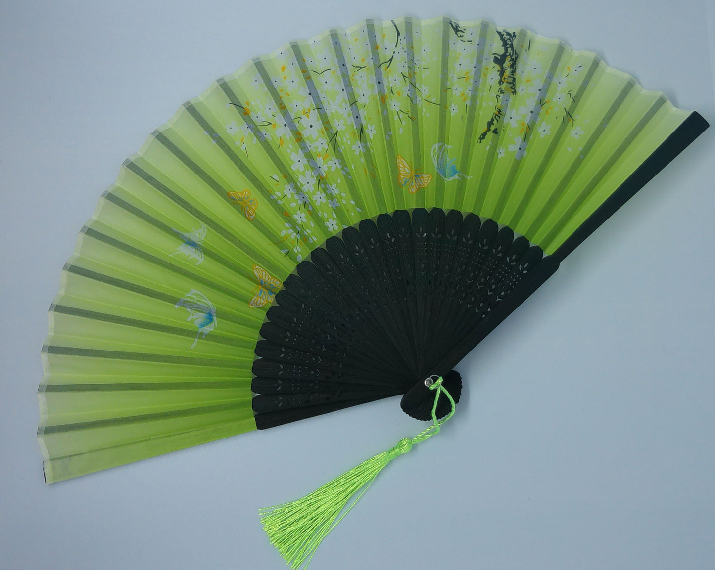 Eventail vert et noir fleuri