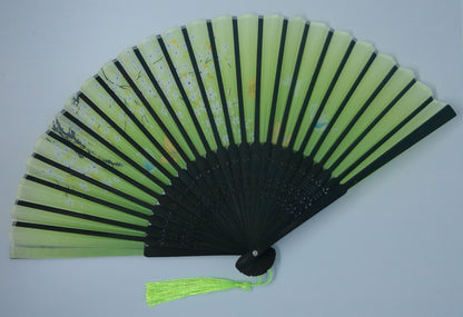 Eventail vert et noir fleuri