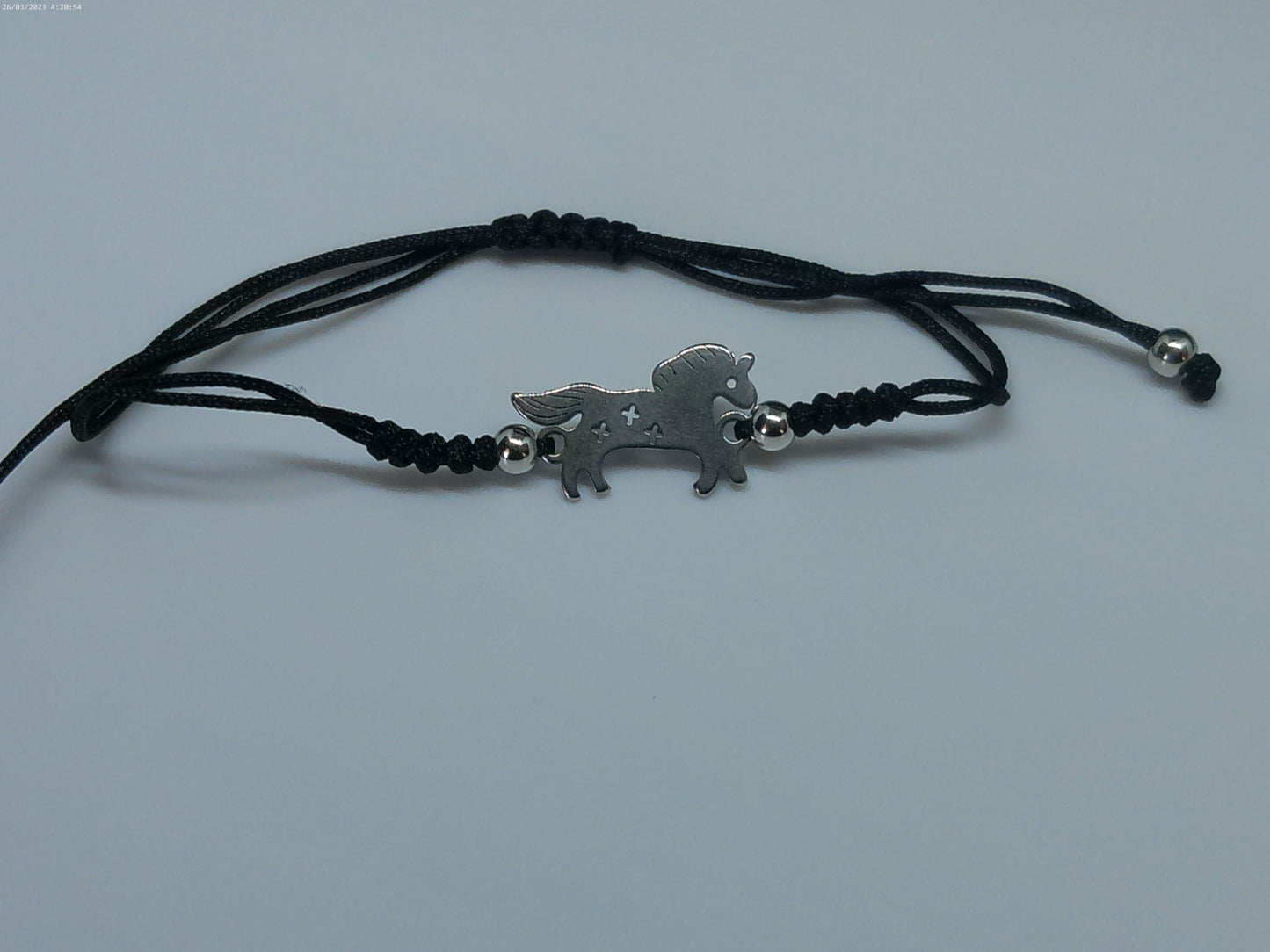 Bracelet symbole en acier inoxydable