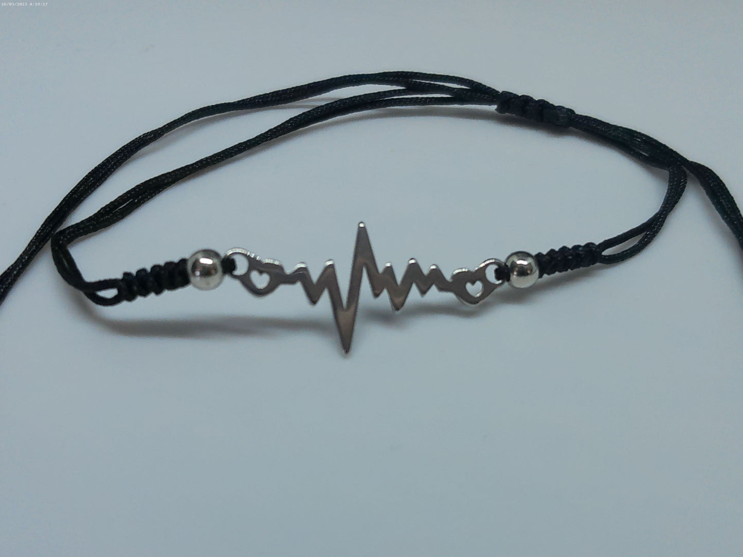 Bracelet symbole en acier inoxydable