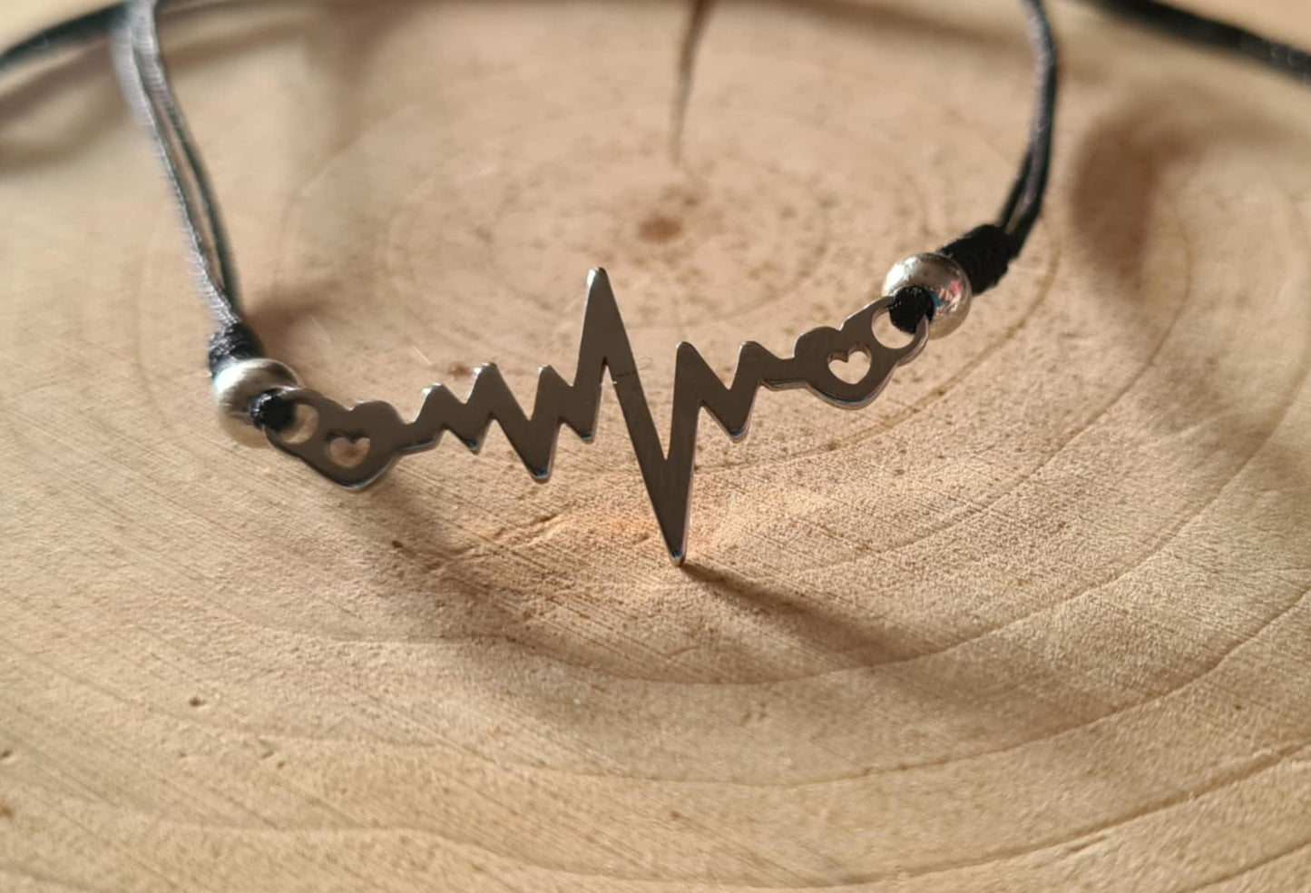 Bracelet symbole en acier inoxydable